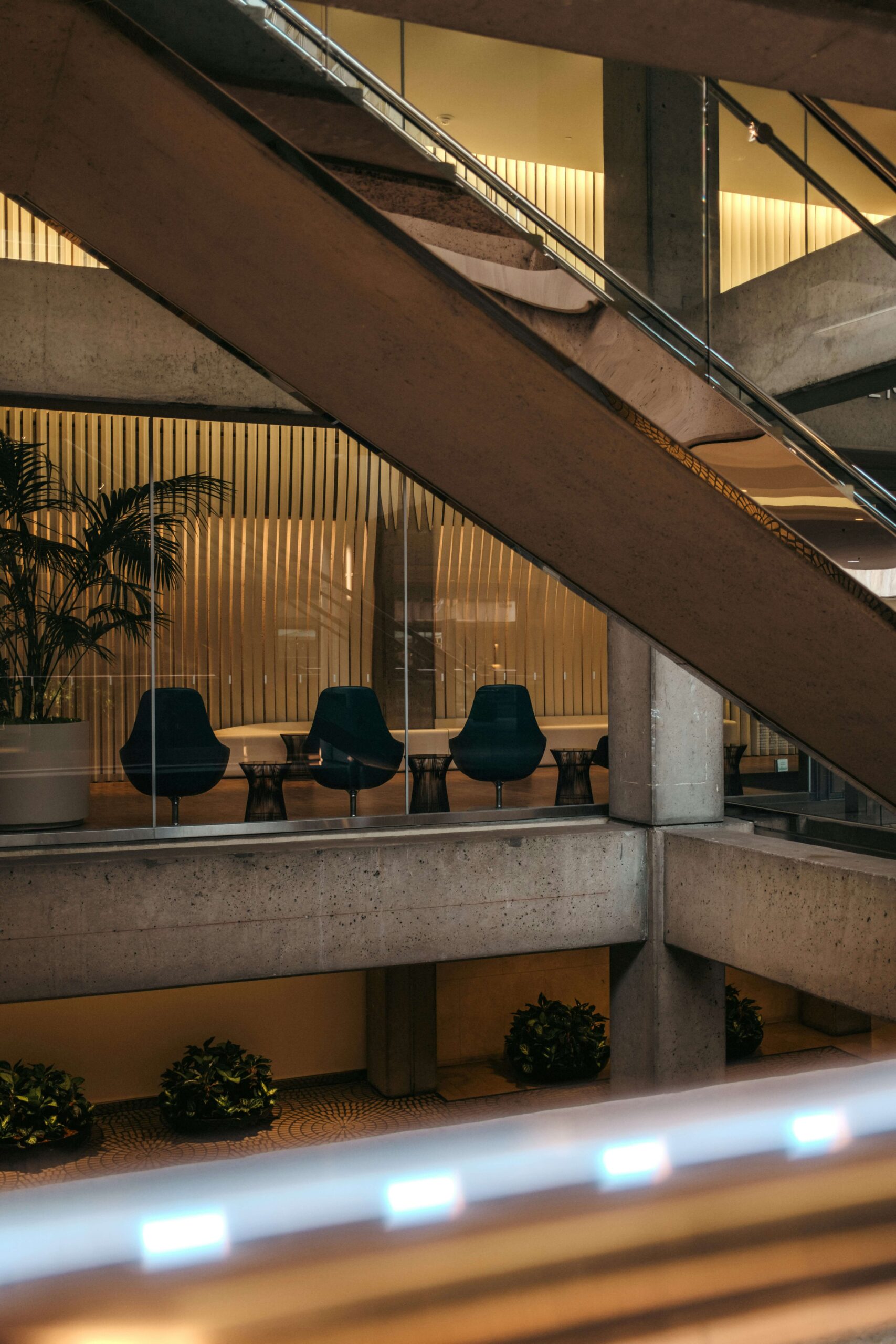 a modern building interior features seating and stairs - pension administration services