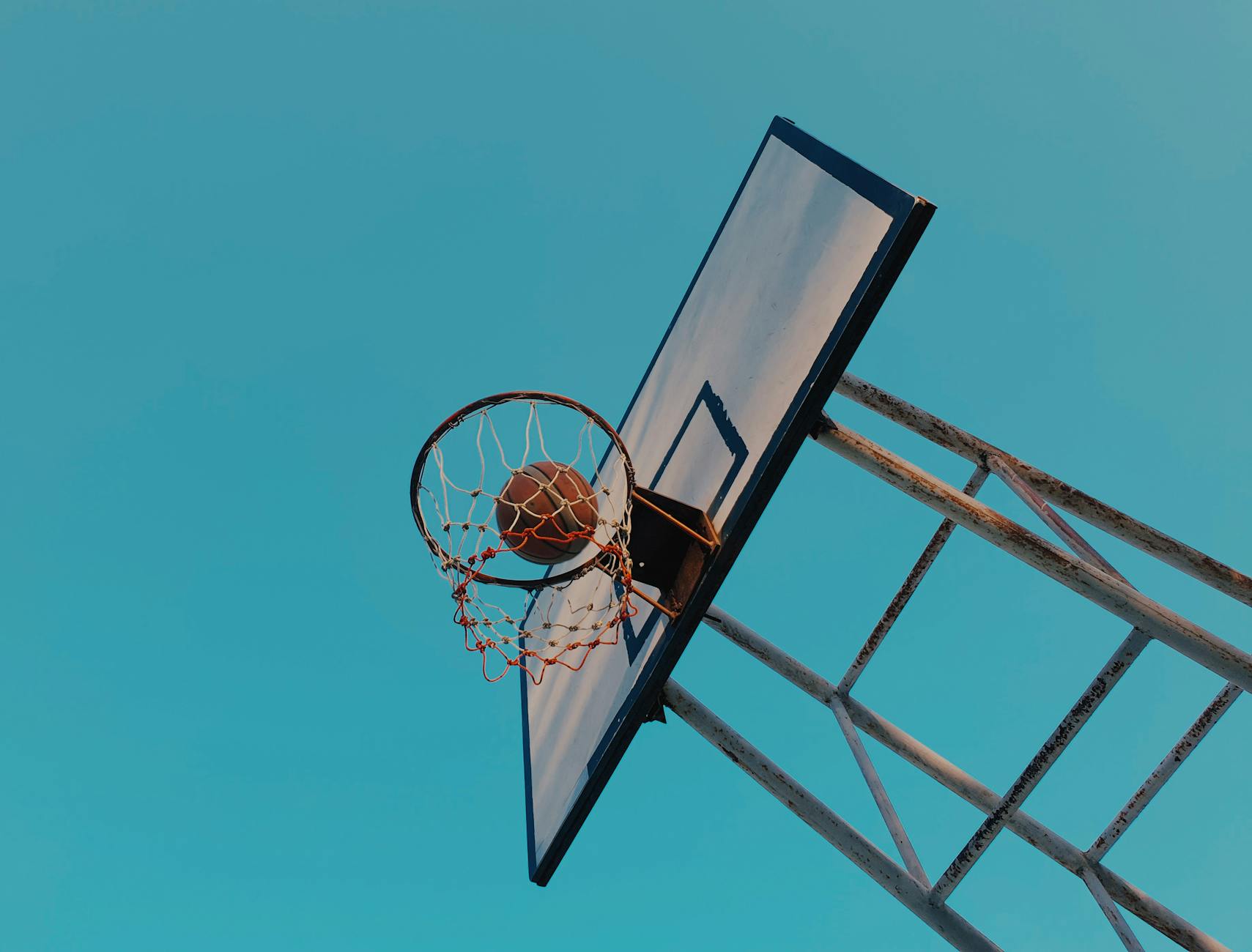 basketball and backboard under blue sky - pension administration analogy