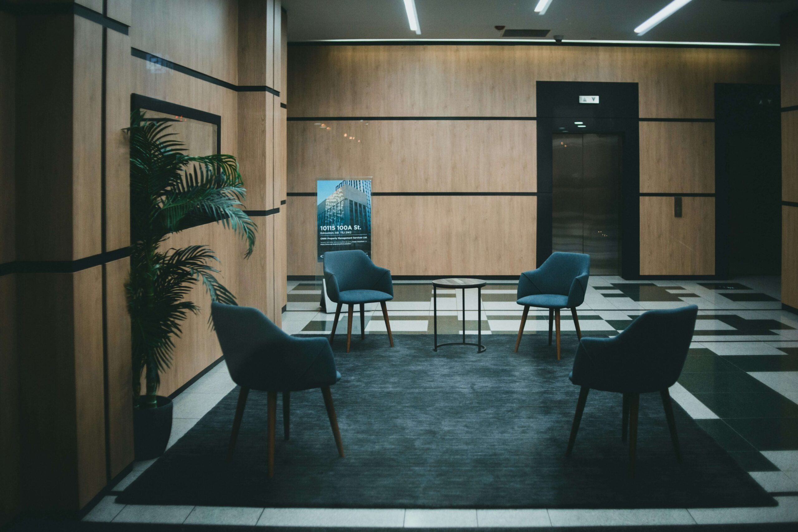 a couple of chairs that are in a room - retirement plan enrollment failures