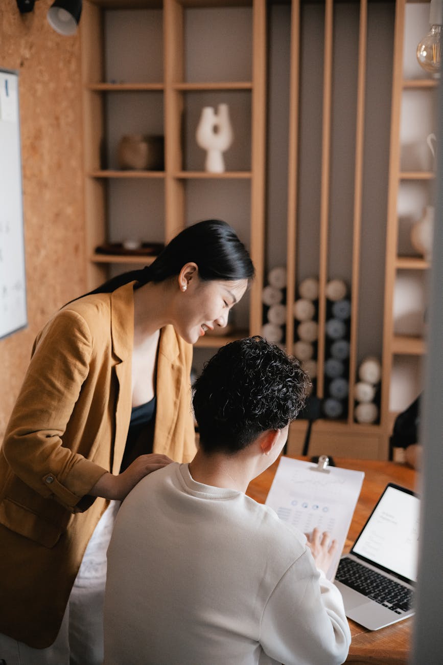man and woman working at the office