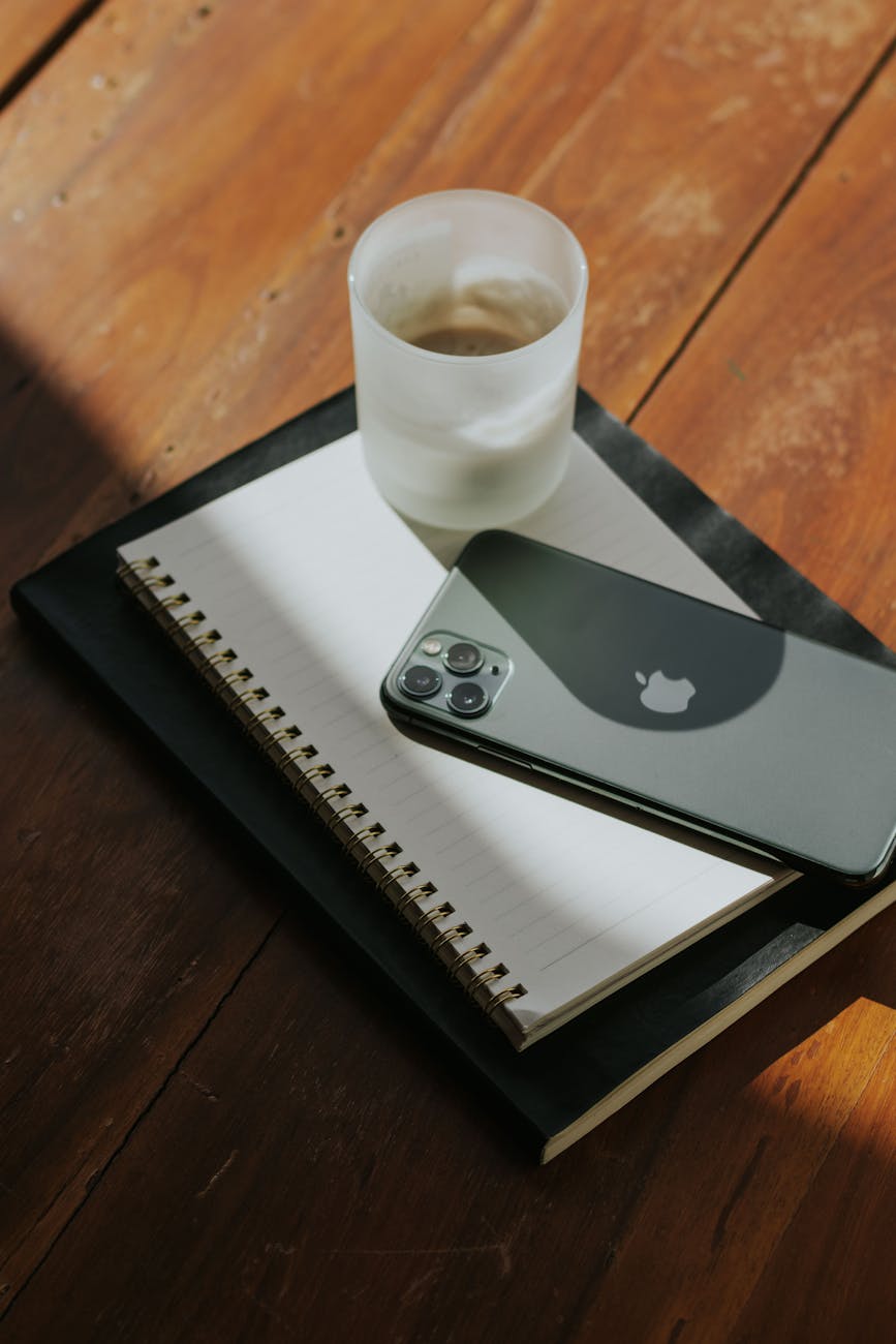 minimalist workspace with smartphone and notebook