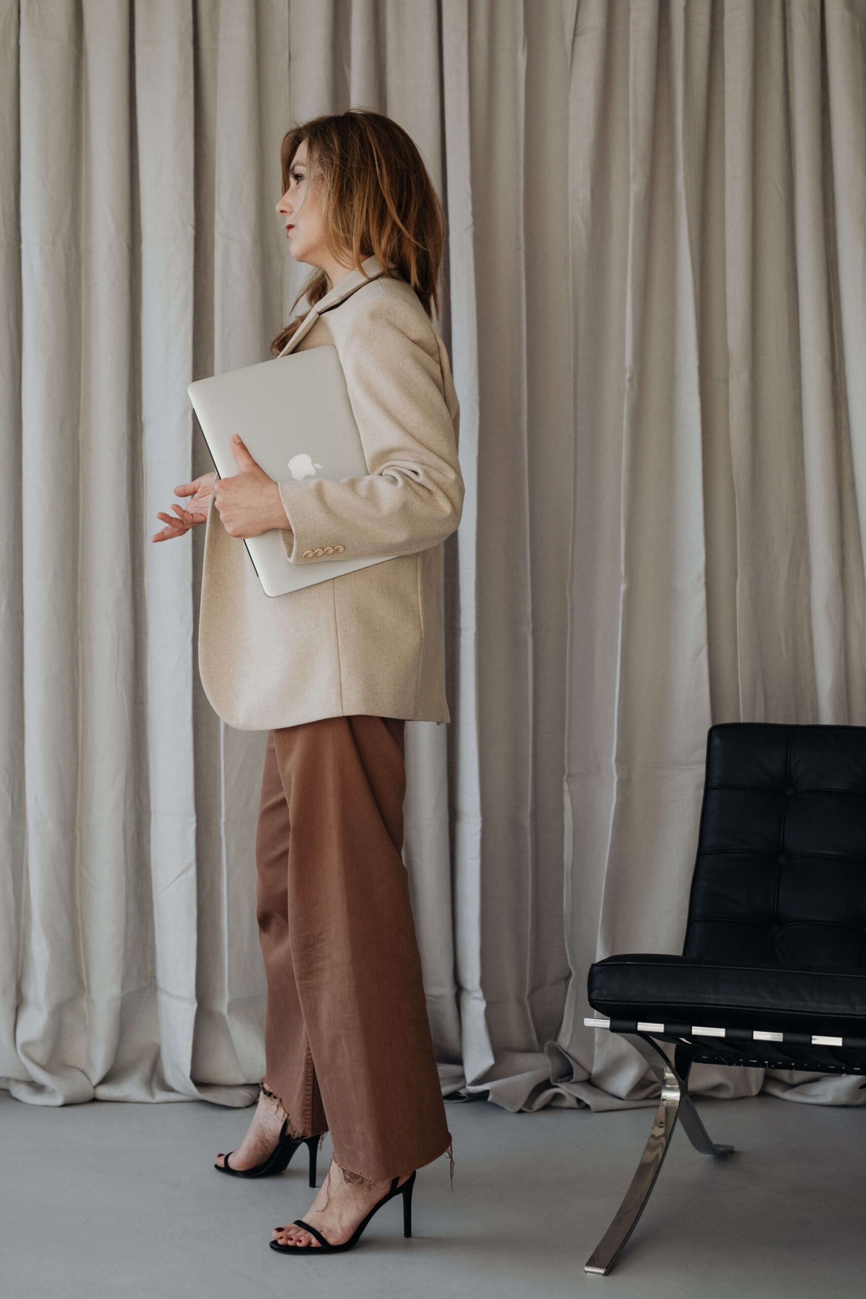 elegant businesswoman in her office - common retirement plan problems