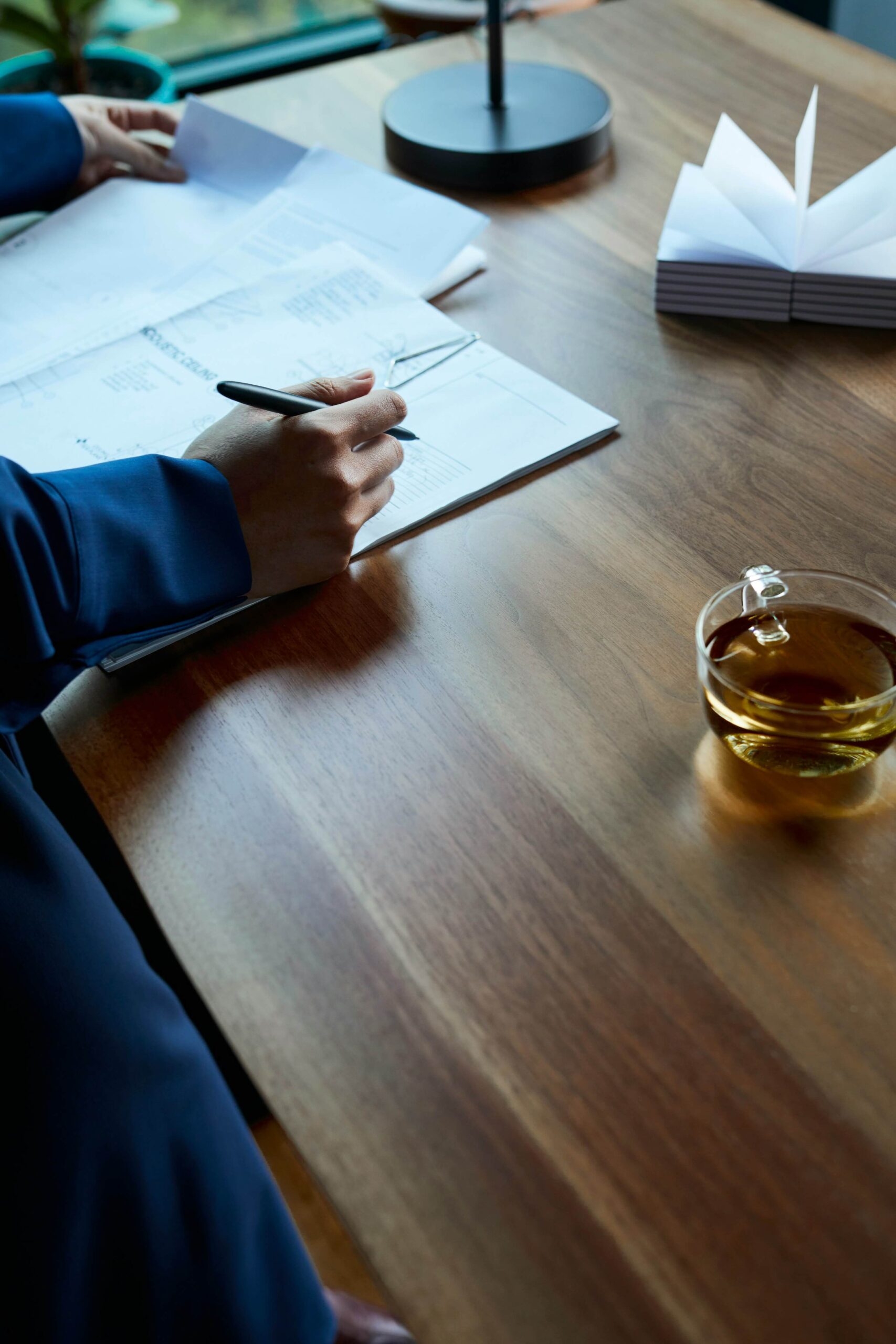 office aesthetic plants macbook mouse work from home modern office when to take RMDs